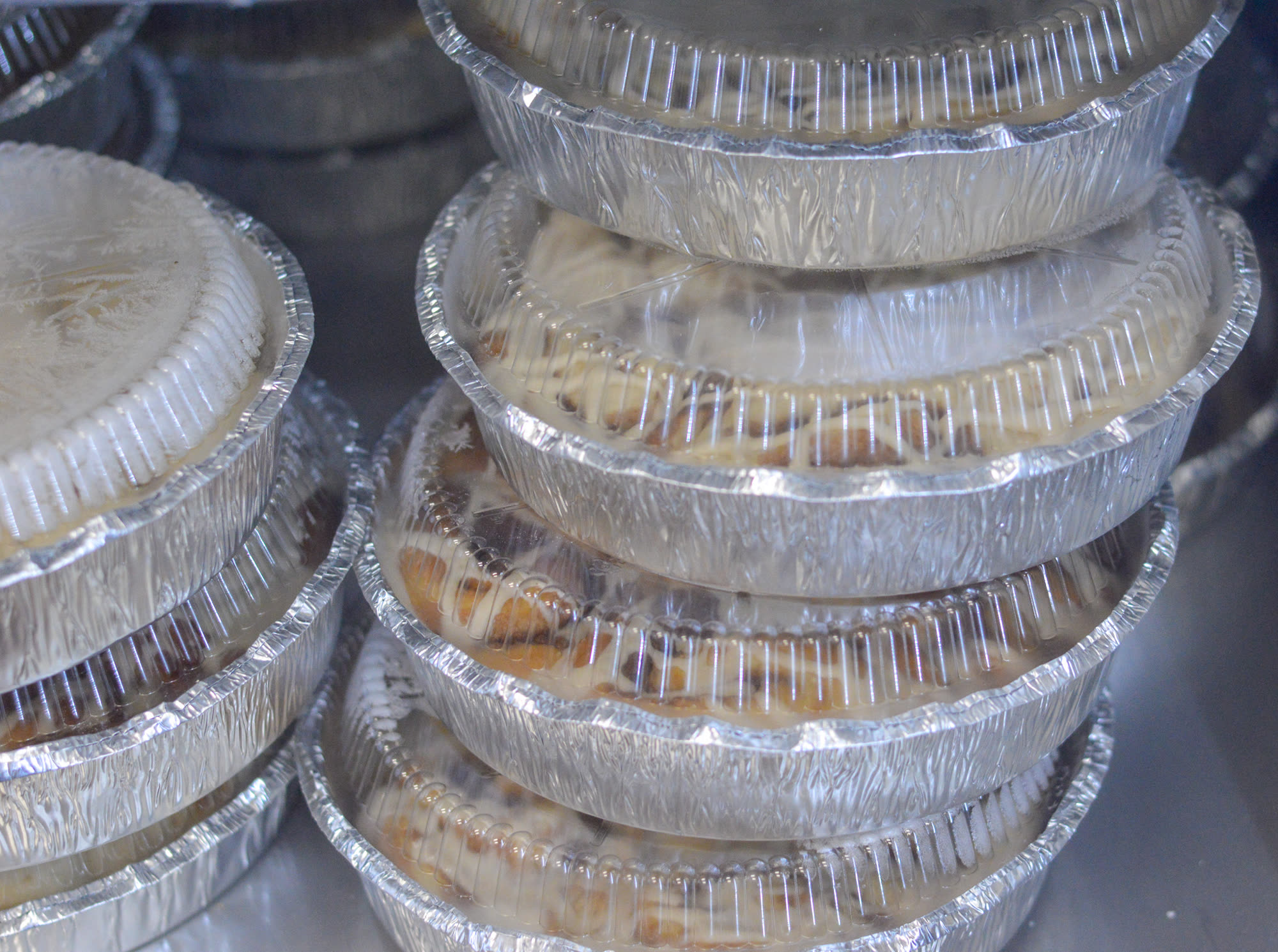 Boxed cinnamon rolls ready for a fundraiser