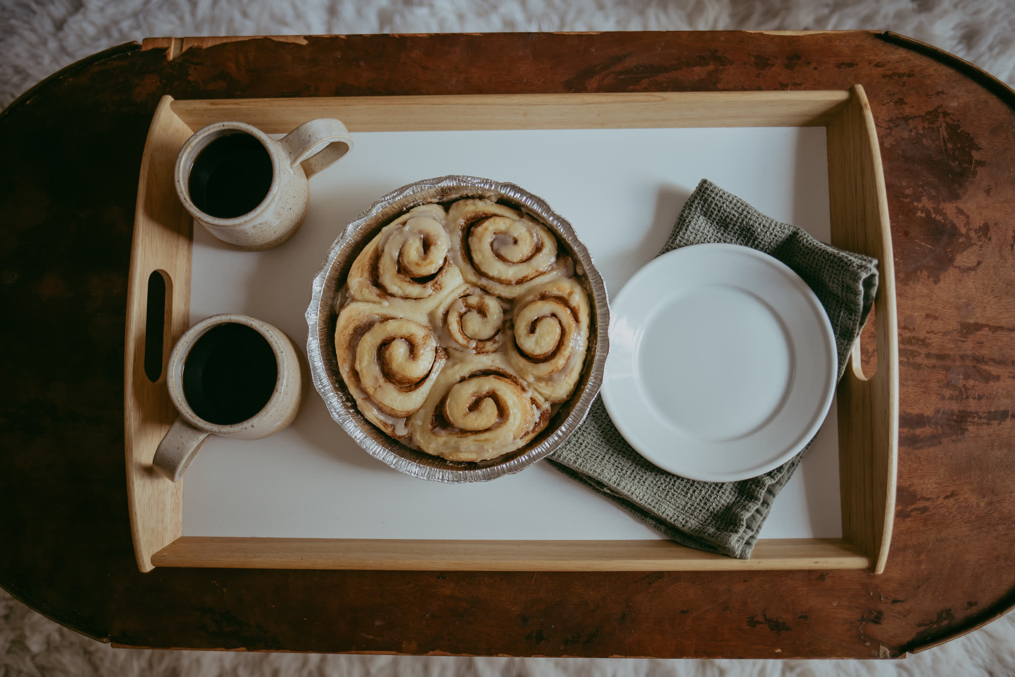 A catering spread of LoveLee cinnamon rolls by the pan